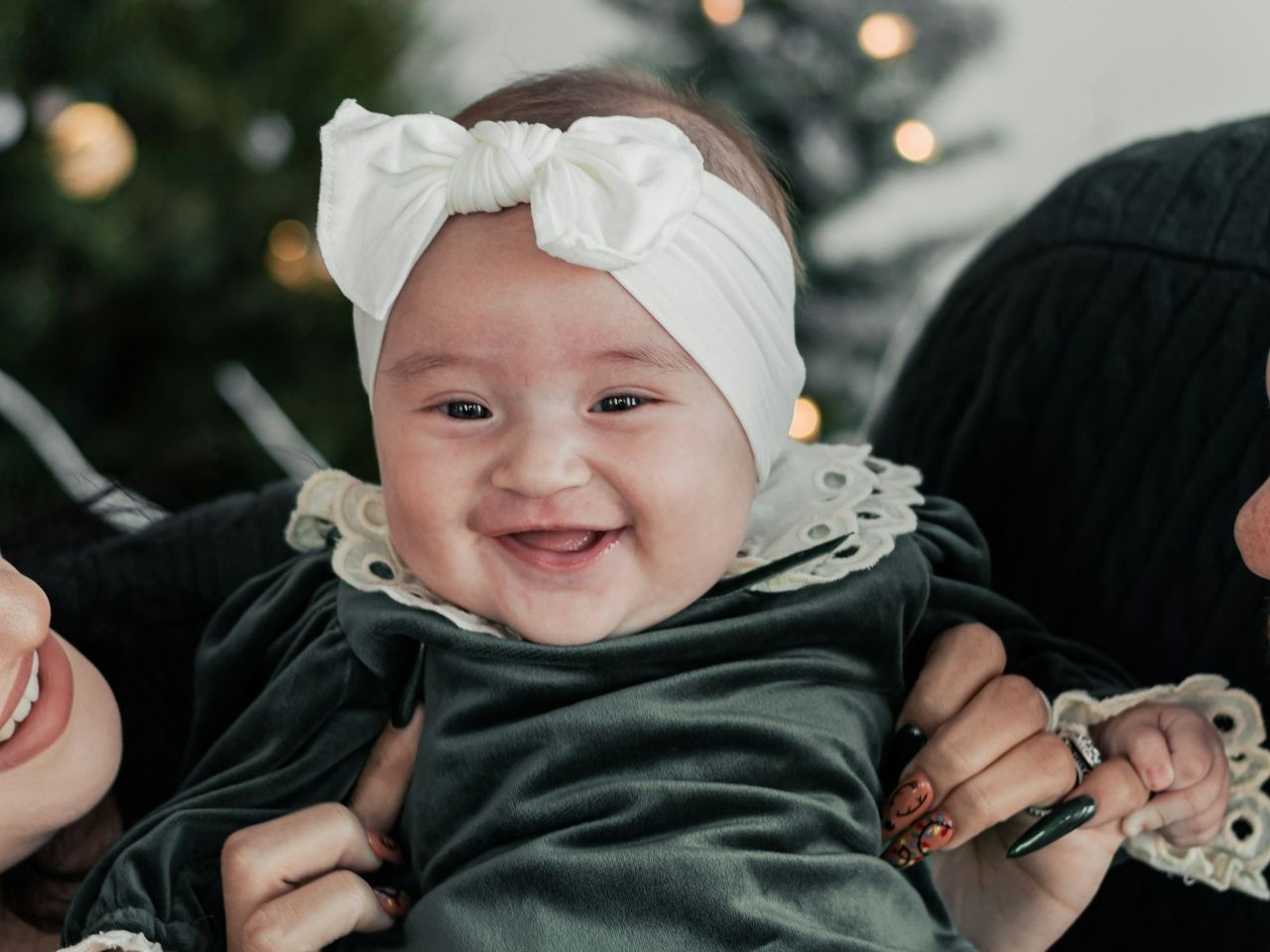 a baby sitting in a chair